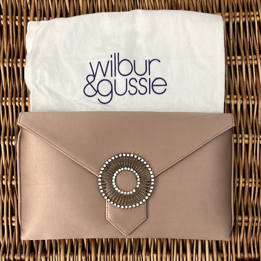 Wilbur Gussie pink clutch Meghan Markle